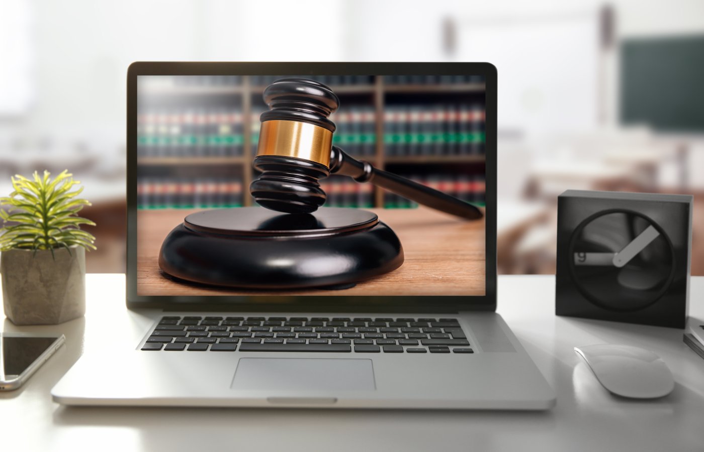 image of gavel on laptop computer