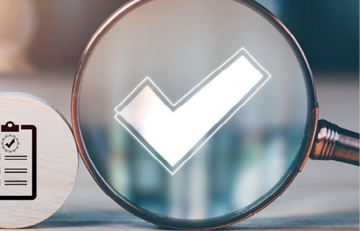 checkmark inside of magnifying glass