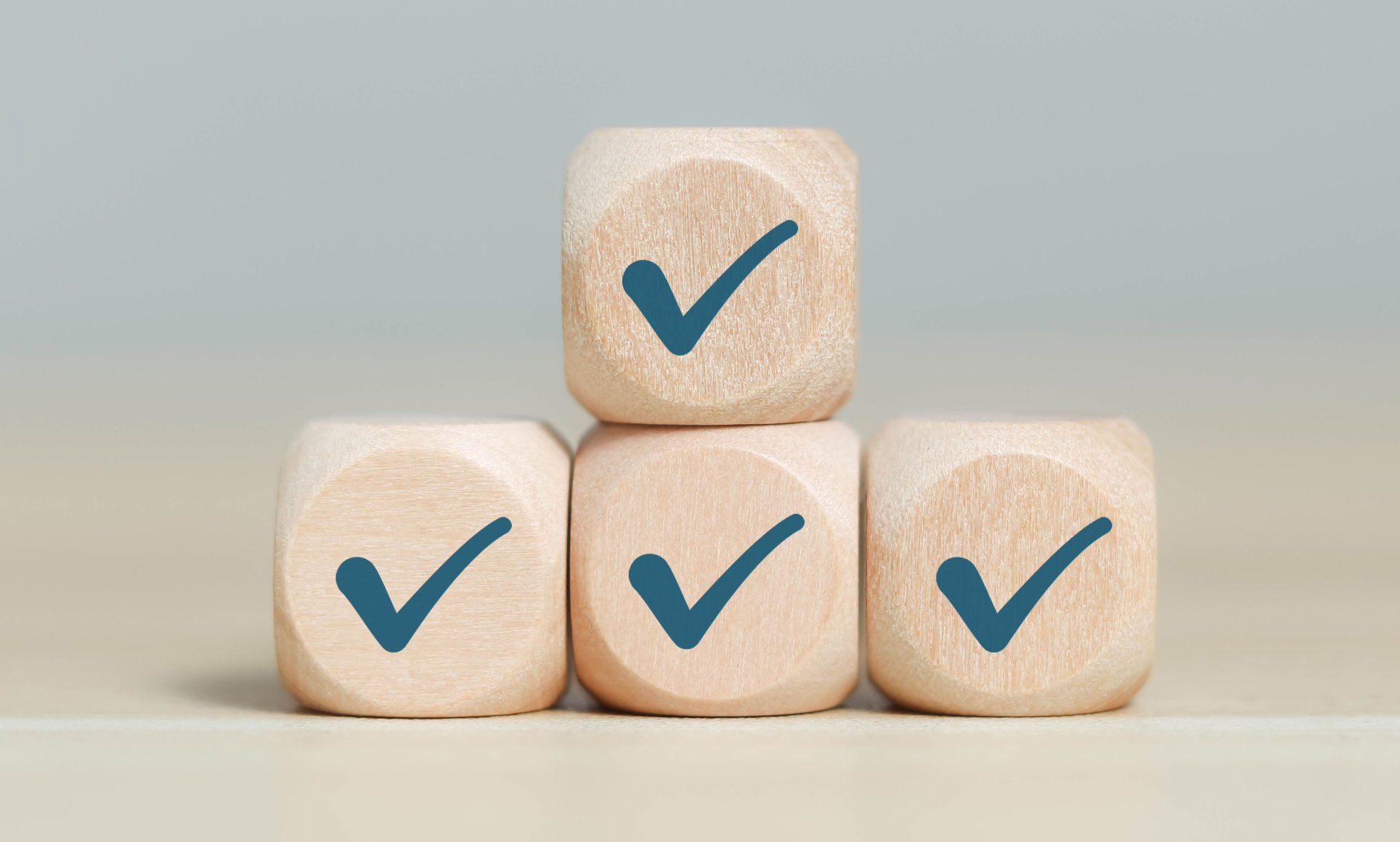 stack of blocks with checkmarks on them