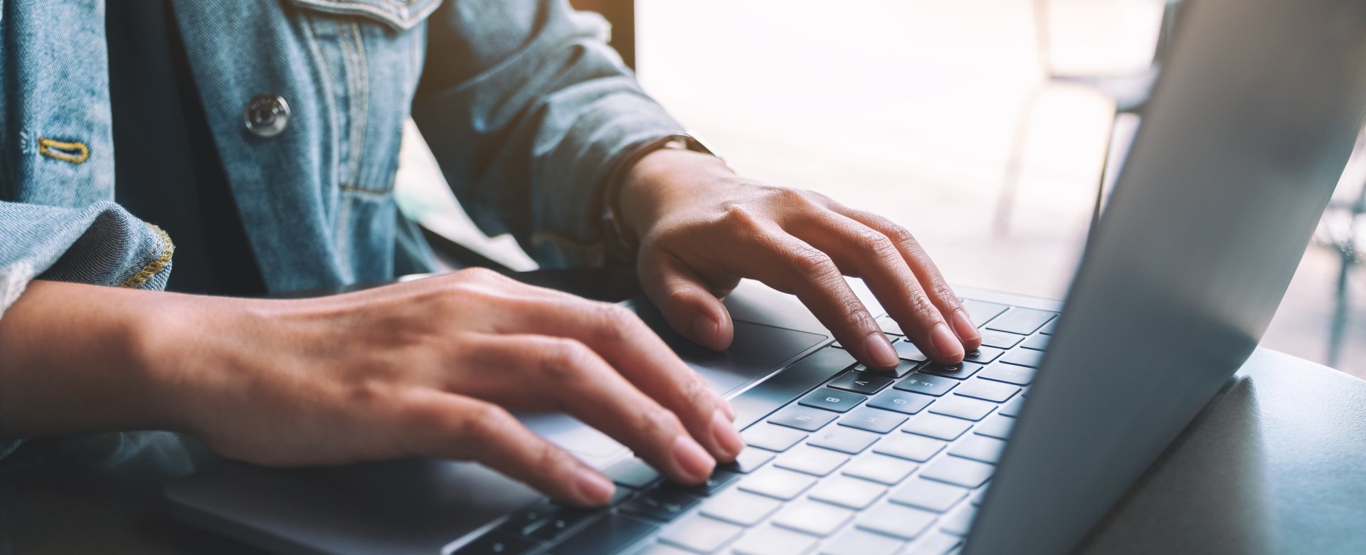 image of hands on keyboard